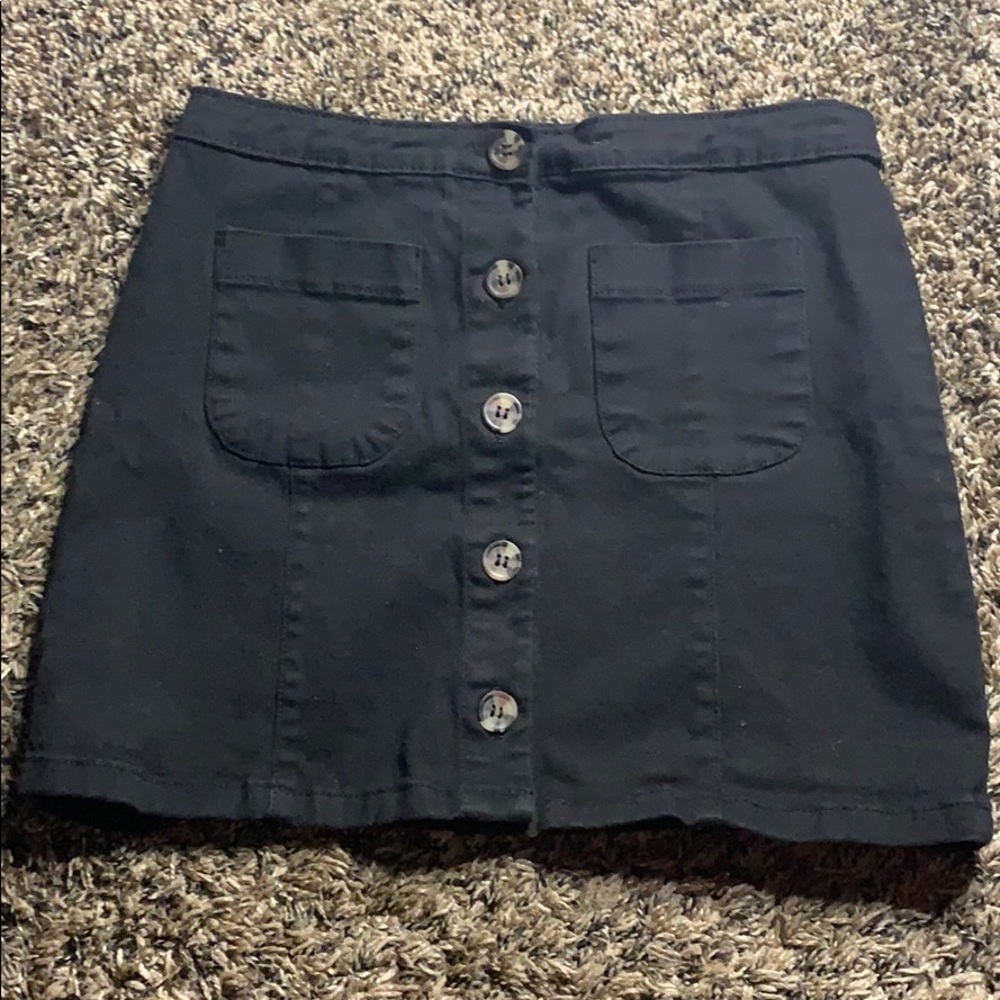 black skirt with buttons